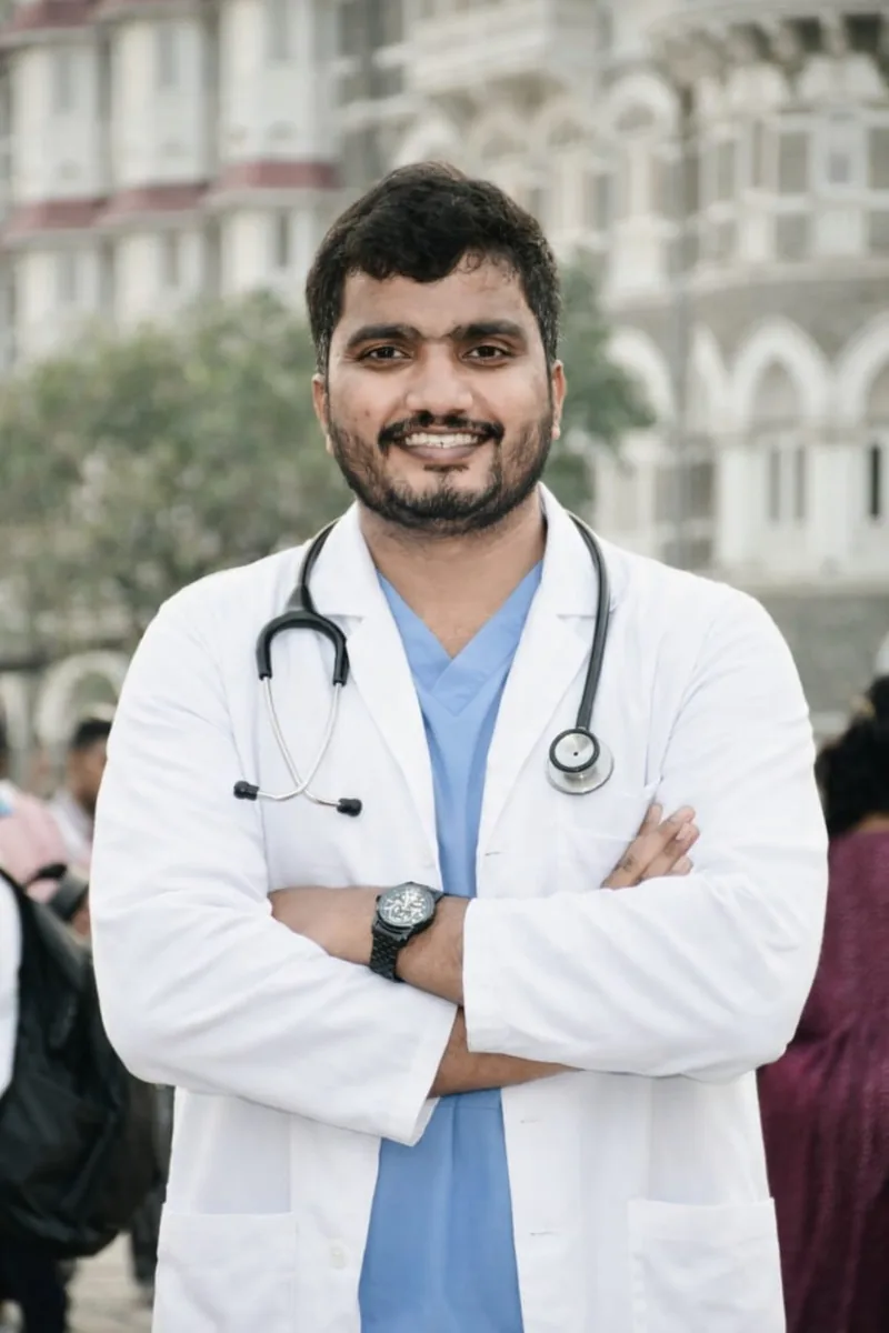 Dr. Akif Ahamad Baig in a white coat